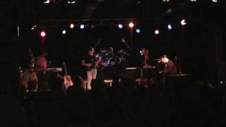 The Stranger Performs "Moving Out" at Amos's South End