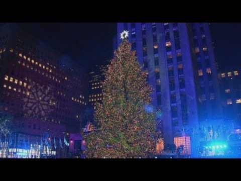 Rod Stewart and Cee-Lo Green help light the Rockefeller Christmas tree in New York