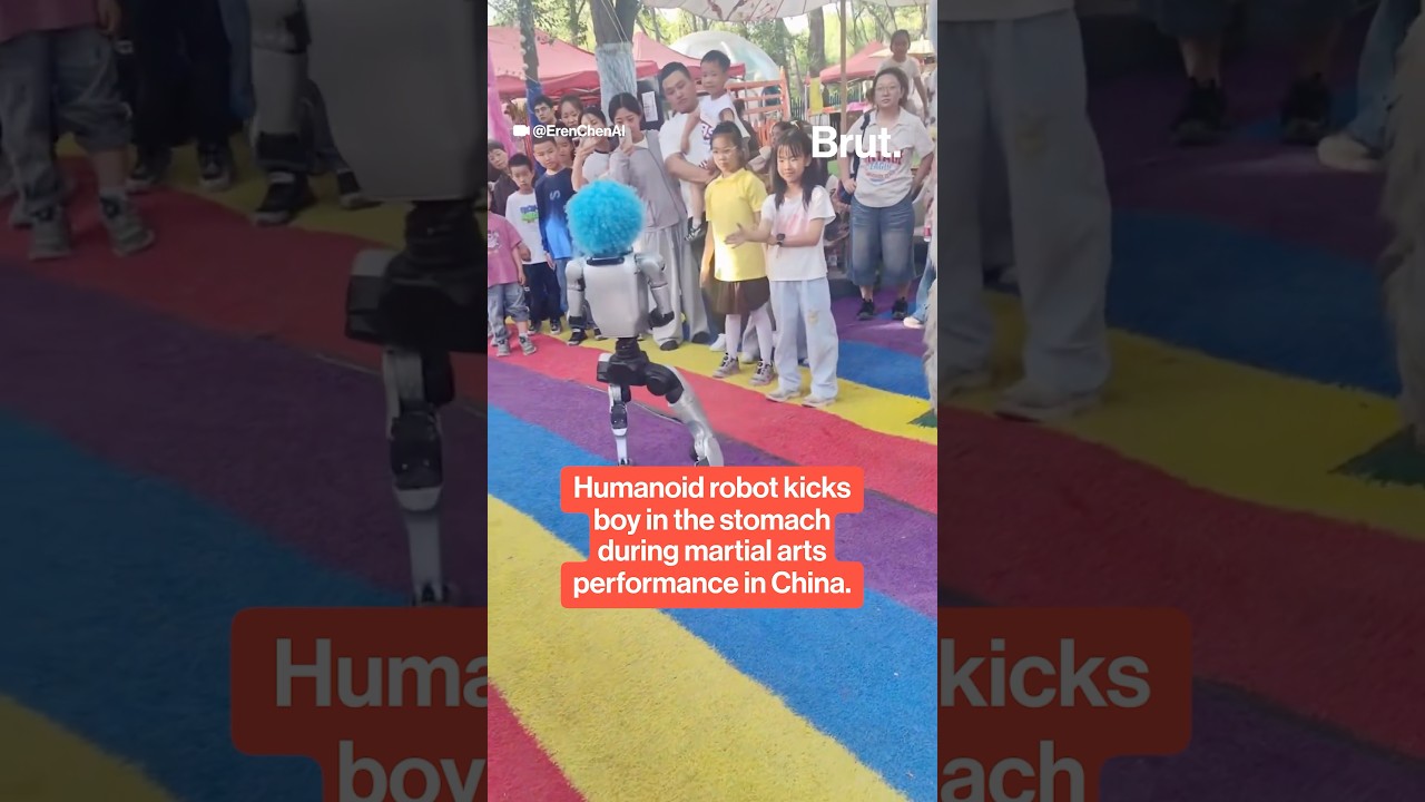 Humanoid robot kicks child during public demo - YouTube
