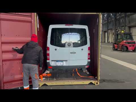 Unloading Container with vehicles at Port of Rijeka, HR - arrived from New York City, USA