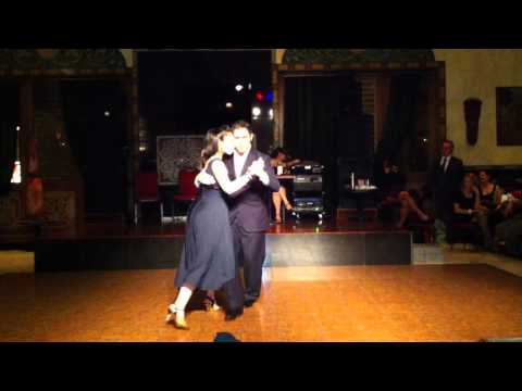  Diego Mohammad  and  Paola Bordon  are  dancing  to  the  vals  "  Romance de Barrio  "  by  Aníbal Troilo