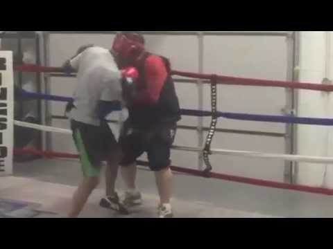 Pugs Boxing Club trainer Gary Dobry working w/ Jose Cuevas