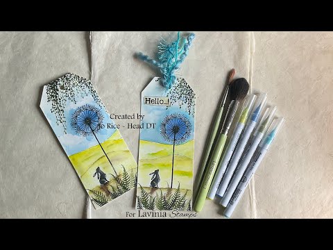 Pipin admiring the Fairy Dandelion on a watercolour tag by Jo Rice #laviniastamps