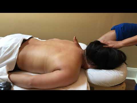 Shoulder massage with feet