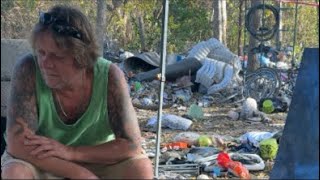 Deep in a homeless camp in the woods