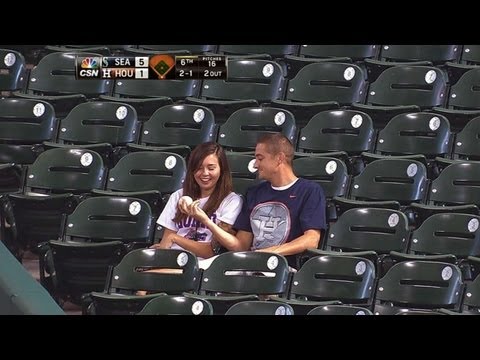 Fan makes catch to save girlfriend from foul ball
