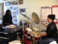 ALPHONSE MOUZON DRUM LESSONS: KEYBOARDIST ALPHONSE MOUZON WITH DRUM STUDENT APRIL KING