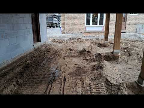 Looking at Topsoil Left Under the Old Heaved Slab