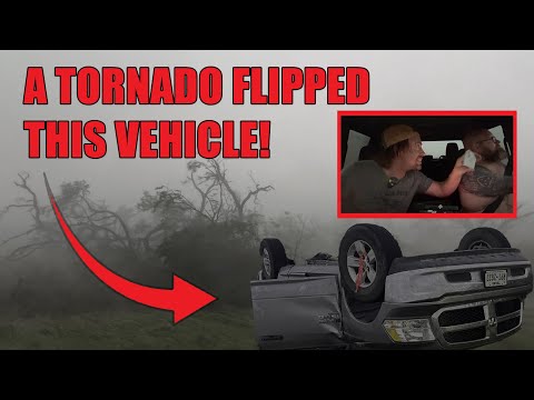 Inside a powerful wedge tornado - TRUCK FLIPS UPSIDE DOWN as couple seeks shelter in the ditch!