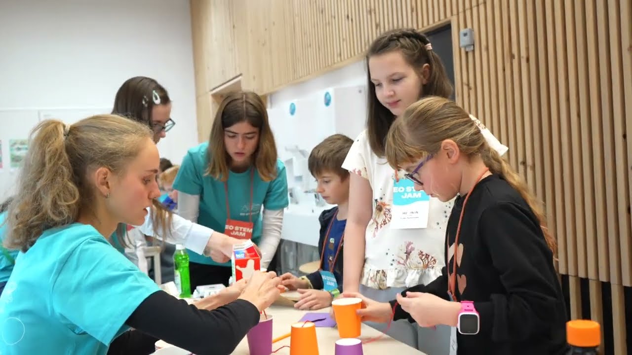 Children exploring a science experiment at EO STEM Jam