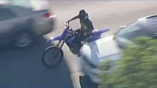 Biker stops for gas mid-police chase