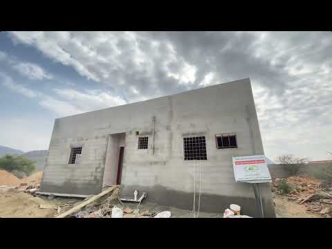 تسليم وحدة سكنية لأرملة تعول يتيمين