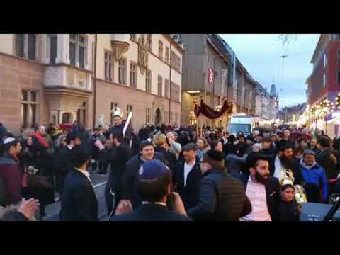 Torah procession in streets of Freiburg im Breisgau in Germany