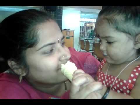 Aadritha eating ice cream with her mom