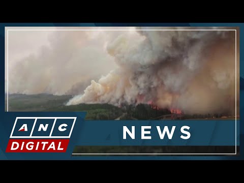 Spreading Western Canada wildfire prompts thousands to evacuate ANC