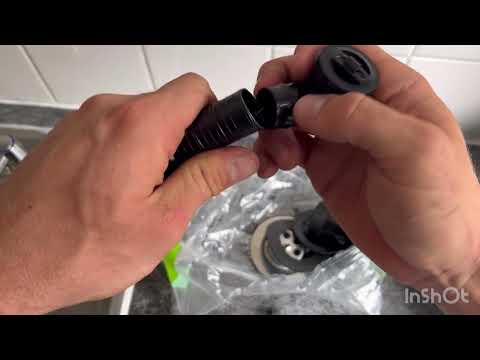 Part of a video titled How to change a kitchen sink waste and overflow - YouTube