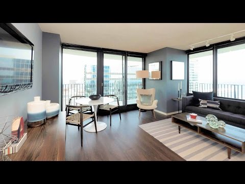 Tour a 2-bedroom model at the iconic Aqua apartment tower