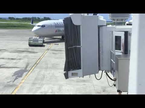 Delta Airlines Boeing 737 ( Skyteam livery ) push back from gate 9 in Montego Bay Jamaica