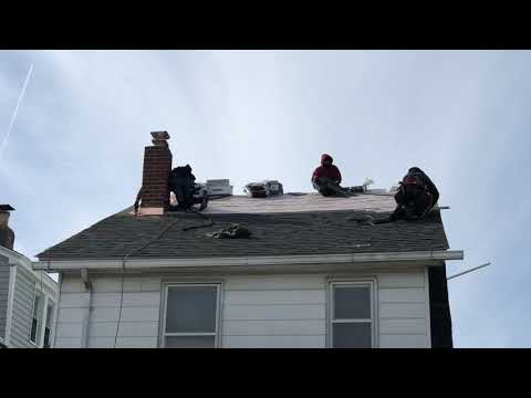 Klaus Roofing Systems by Triple H Installing New IKO Dynasty architectural lifetime shingles in Ozone Park, NY
