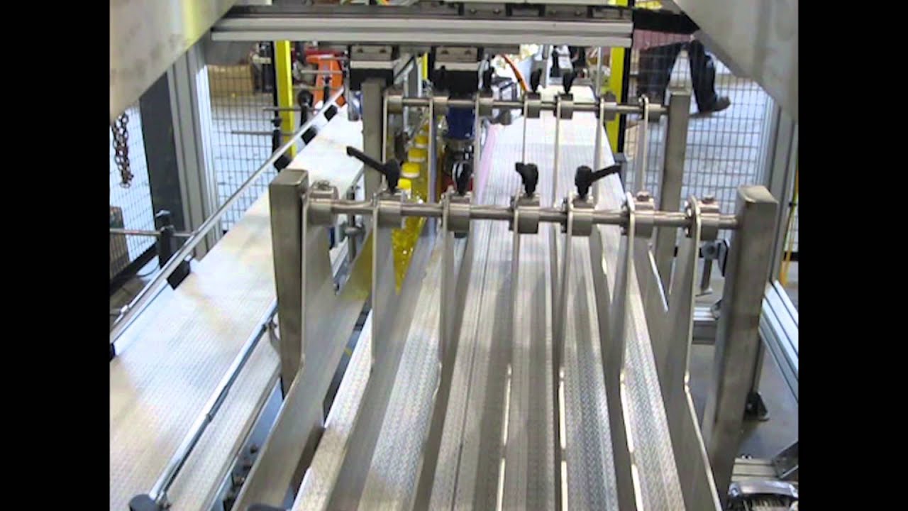 Robotic Packaging System Packs Cooking Oil Jugs - StrongPoint Automation