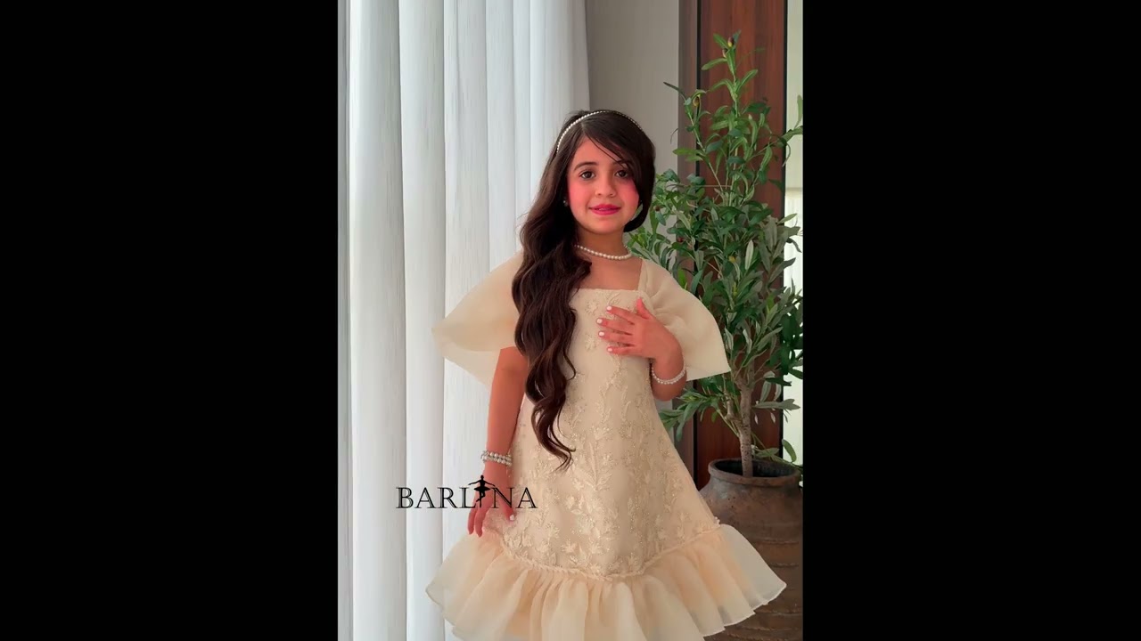 Girls' short beige dress with luxurious embroidery - year 1