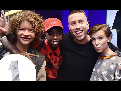The cast of Stranger Things with Grimmy
