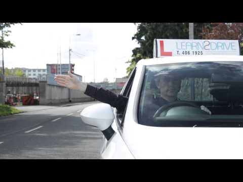 Driving lessons Dublin. Hand Signals in the Irish driving test.Driving test hand signals.014061925.
