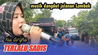 Download lagu TERLALU SADIS ~ nia dirgha irama dopang -musik dangdut jalanan Lombok mp3