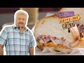 Guy Fieri Eats a Peruvian Chicharron Sandwich | Diners, Drive-Ins and Dives | Food Network