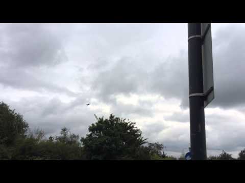 Mk 9 spitfire flys past polish war memorial , awesome sound