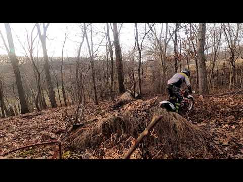 Playing on my 2015 KTM Freeride 250r, fallen log feature