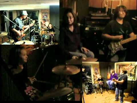 Cry Baby & The Wah Wah's. 7 year old drummer 12 year old guitarist