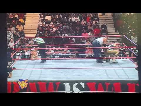 Goldust Uses Cheating Tactics to Defeat Savio Vega Marlena’s Golden Purse with “Brick” Inside Empty