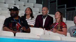 Paralympian Marissa Papaconstantinou and Devin Heroux watch bowls at the Commonwealth Games
