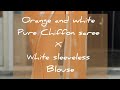 Orange And White Pure Chiffon Transparent Saree Teamed Up With White Sleeveless Blouse