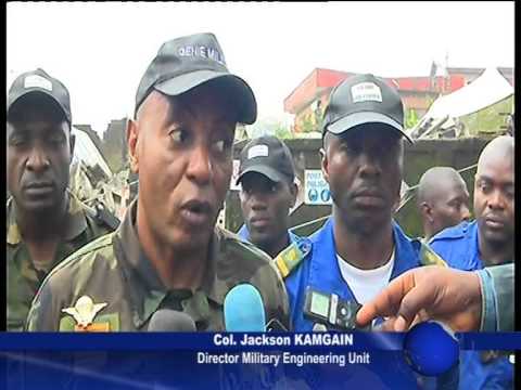 MILITARY ENGINEERING UNIT DEMOLISHES UNSTABLE BUILDING IN BONAPRISO,DOUALA, CAMEROON