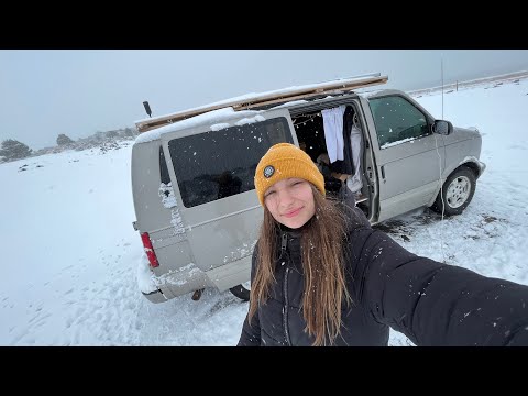 surviving my first winter storm ❄️ solo female vanlife in winter
