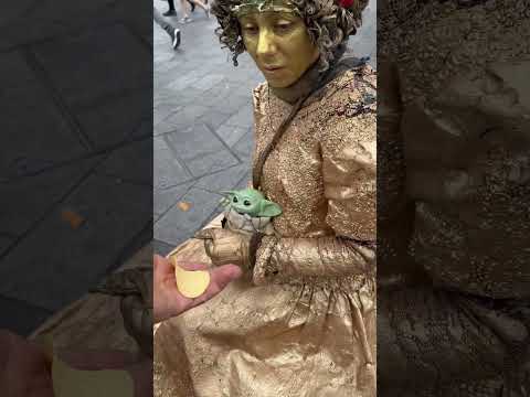 Gold Lady against wind in London #performer #shortsviral #statue #livingstatue #goldlady #goldenlady