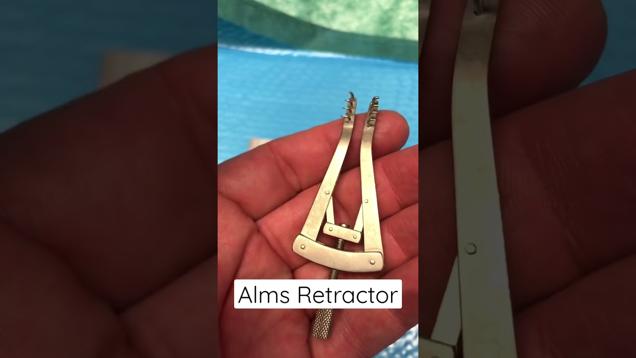 Alms Retractor