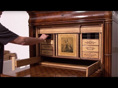 Demonstrating the Clever Secret Compartments in This Masterpiece Desk