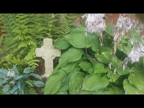 THE CELTIC CROSS IS NOW IN ITS FINAL POSITION IN MY GARDEN.