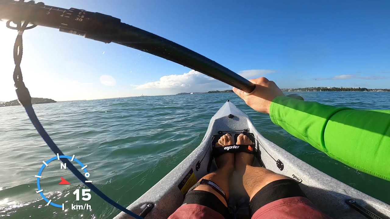 Paddling the Epic kayak V7 surf ski in Auckland harbour, New Zealand.