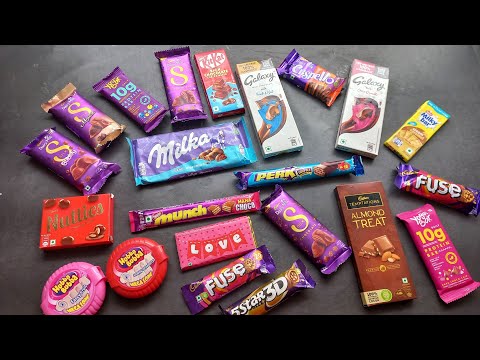 100 candies opening, chocolate a video, lots of chocolates, Cadbury celebration, surprise toys