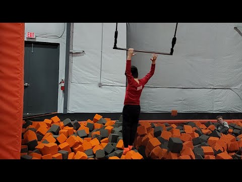 Swinging and Jumping into a Foam Pit | Air Madness Trampoline Park #shorts #foampit #swing #jump