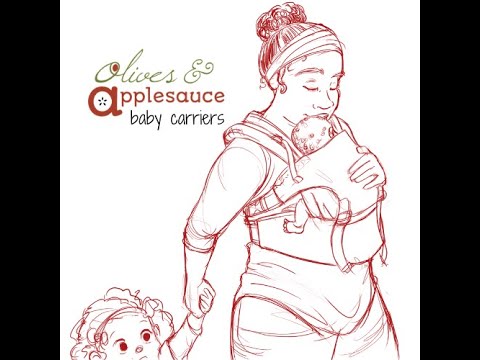 Feeding in an Olives and Applesauce Baby Carrier
