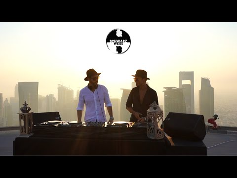 SCHWARZ WEISS DJ live set in Doha on the Helipad of JW Marriott during sunset with skyline view