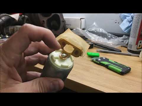 Walbro 450 fuel pump install in Evo 8