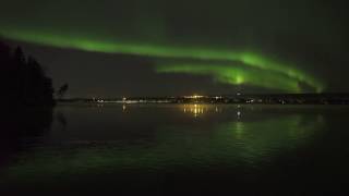 Aurora Borealis over &quot;Swan Lake&quot; in Rovaniemi Lapland Finland.