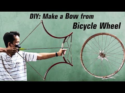 Bow made from bicycle wheel, arrow rest made from PVC pipe