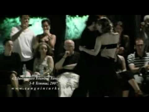  Damian Rosenthal  and  Celine Ruiz  are  dancing  to  a  tango